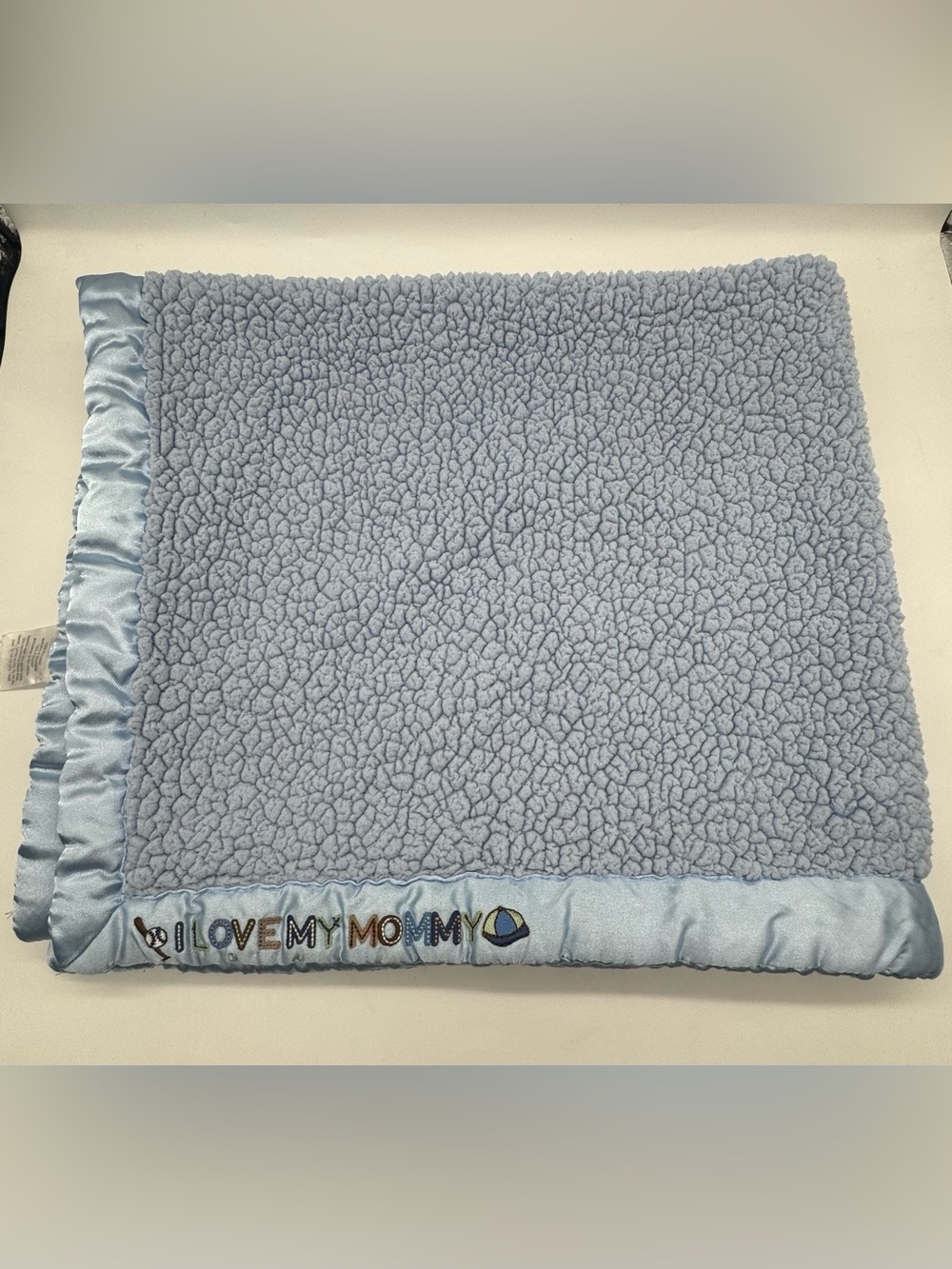 Bean Sprouts Baby Blanket with Silk Edges and Silk Back saying “I Love My Mommy”